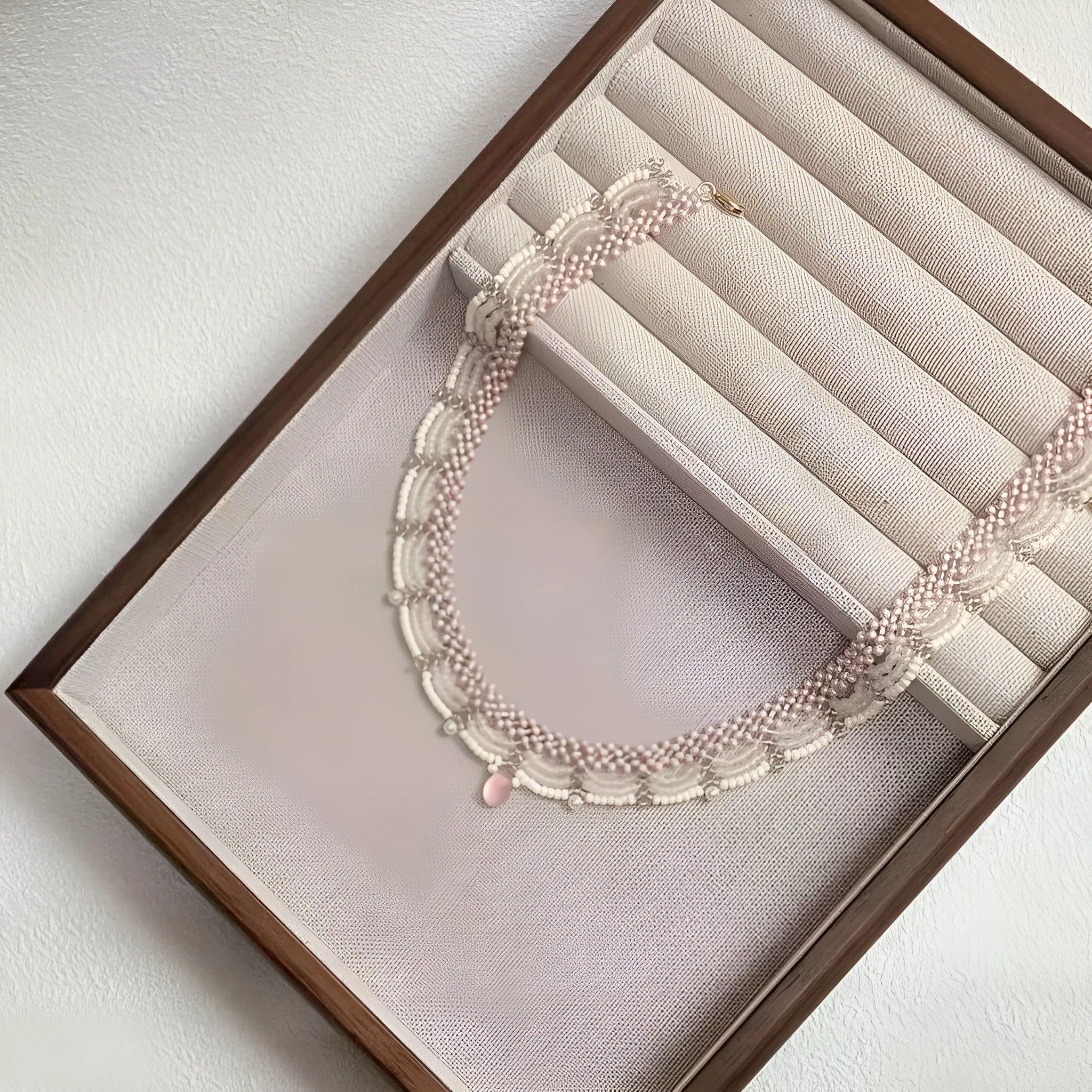 Hand-woven glass beaded wave necklace in pink with alloy pendant and matching bracelet