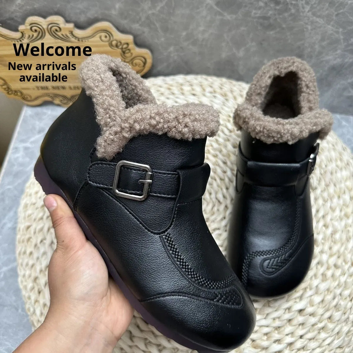 Winter slip-on ankle boots for women in black synthetic leather with low platform heel and round toe
