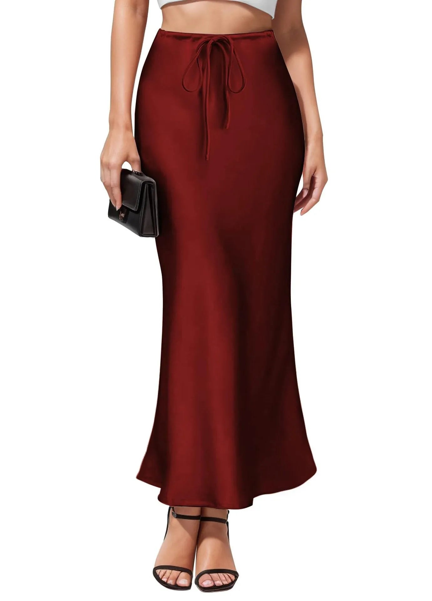 Acetate fabric asymmetric skirt with high waist and irregular stitching in solid colour