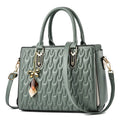Women's black large-capacity shoulder messenger bag with an external sandwich pocket.
