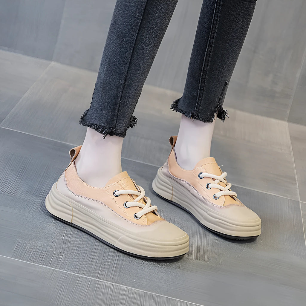 Women's leather platform sneakers in matcha green, orange, and purple colours showing round toe and lace-up design