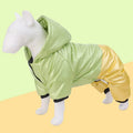Green waterproof cotton dog coat with four-legged design on medium-sized dog