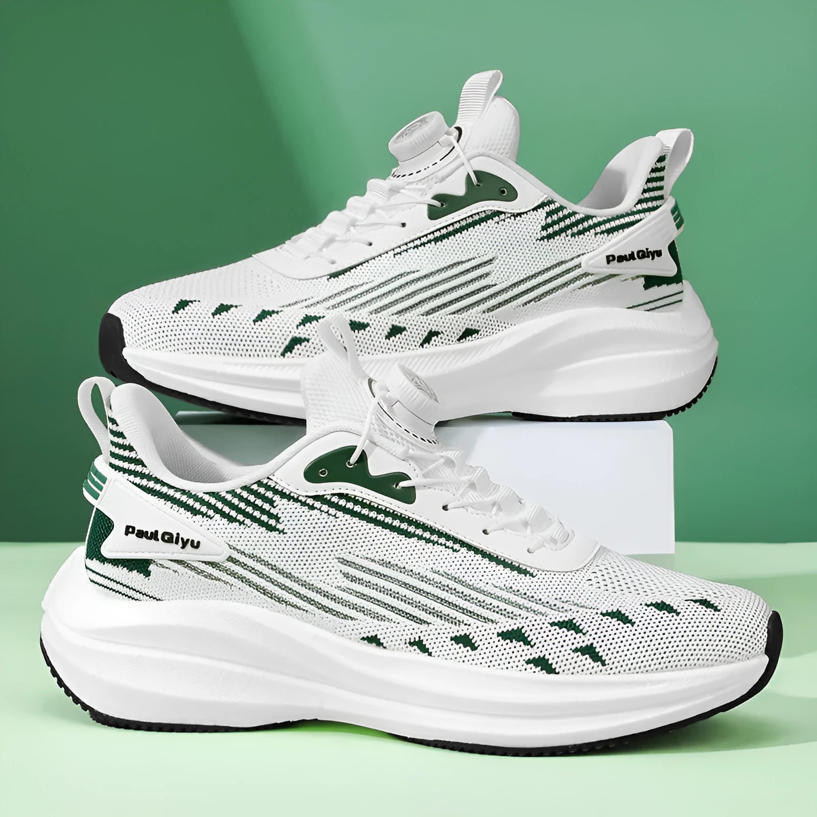 Men's white green and gray running shoes with rotating buckle and mesh upper on flat TPU sole.