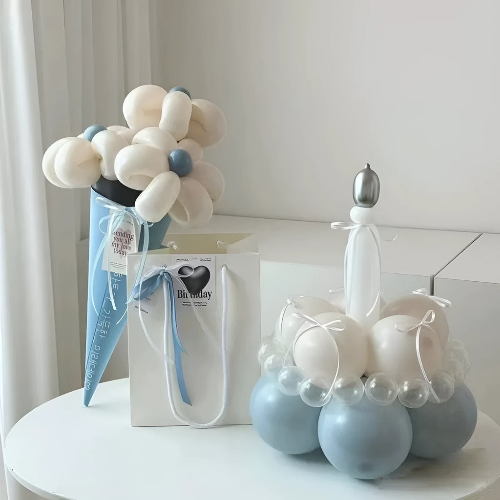 Round pre-made balloon bouquet cake arrangement with decorative stems for party table centrepieces
