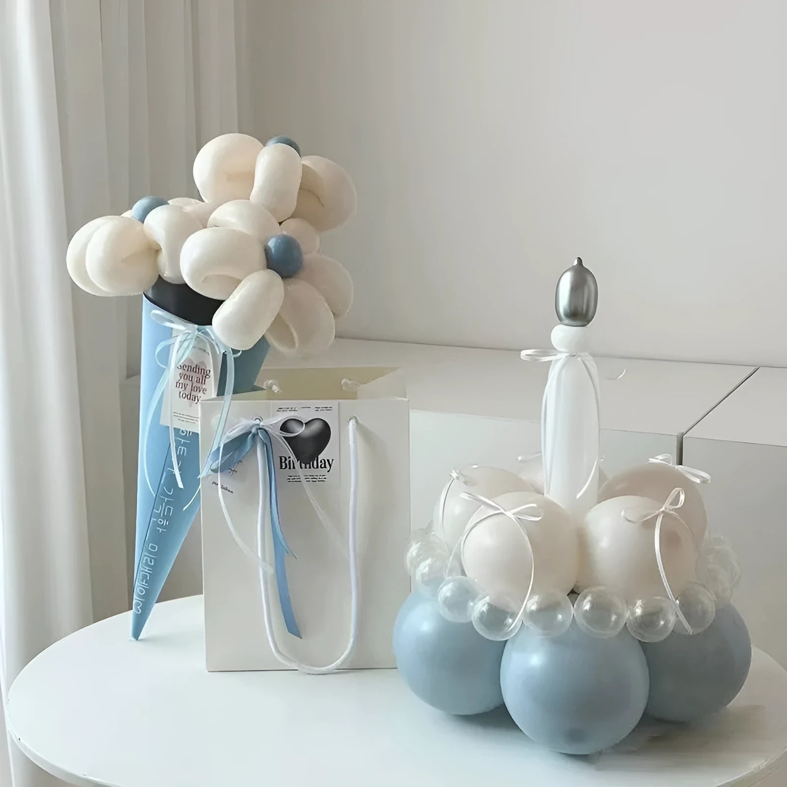 Round pre-made balloon bouquet cake arrangement with decorative stems for party table centrepieces