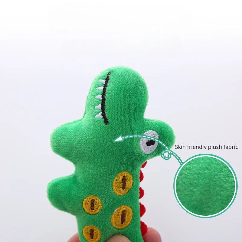 Green parrot-shaped plush cat toy with catnip filling, shown next to a cat for scale.