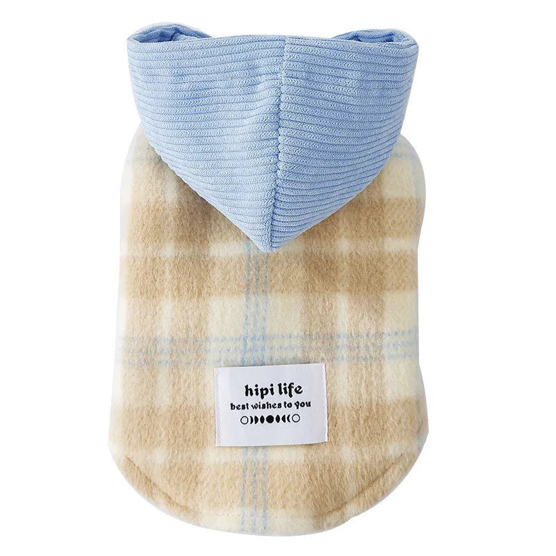 Blue corduroy chessboard grid hooded vest for dog on model showing hooded traction design