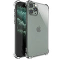 Clear transparent shockproof TPU phone case for iPhone models on a table.