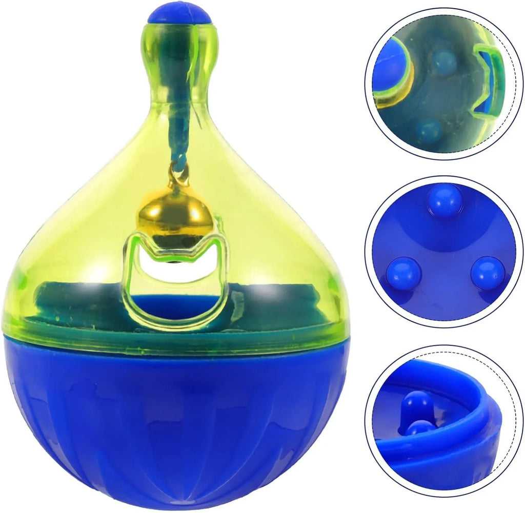 White tumbler-shaped dog and cat treat dispenser toy on a wooden floor