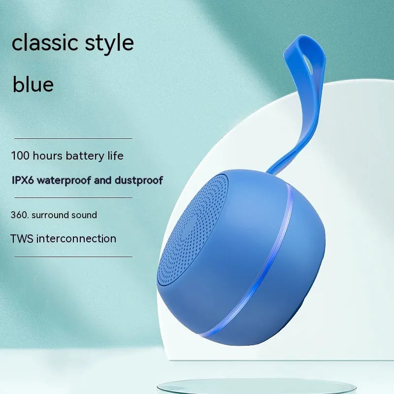 Mini Bluetooth speaker in red with waterproof and drop-resistant plastic body and voice prompt function