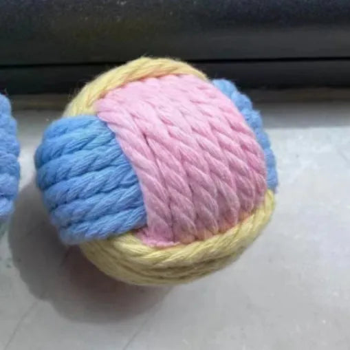 Handmade cotton plush ball cat chew toy measuring 5cm in diameter with textured surface