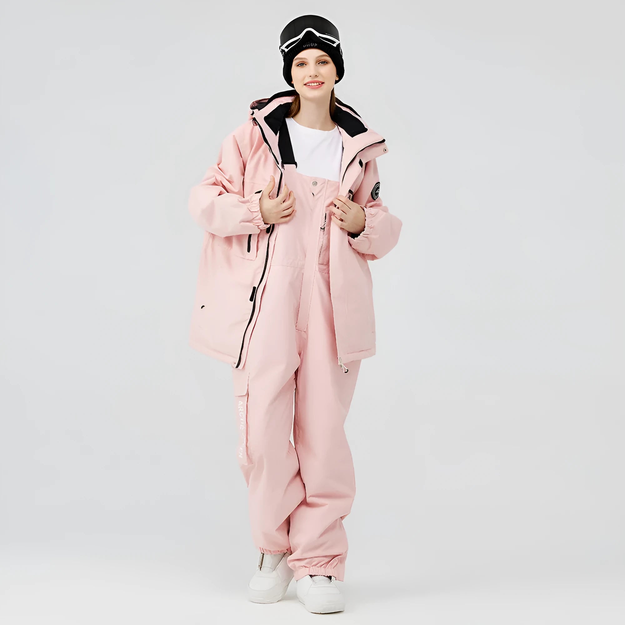 Men's and women's winter ski suit in blue top and black pants, waterproof and windproof for snow sports