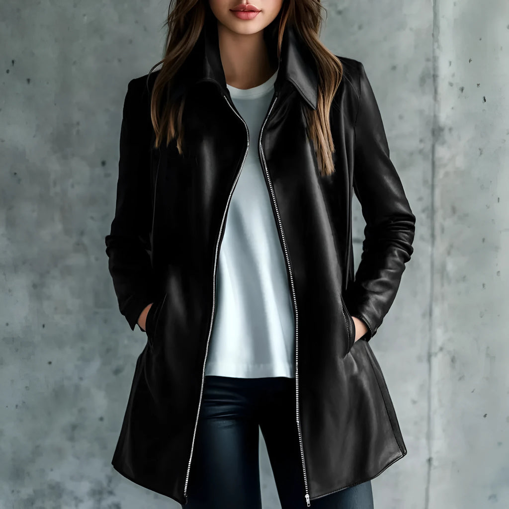 Women's solid black medium-length leather jacket with long sleeves laid flat.
