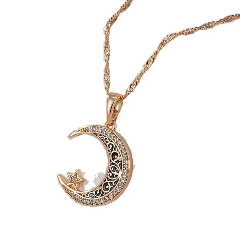 Rose gold star moon pendant necklace with zircon crystals and enamel detailing on water wave chain