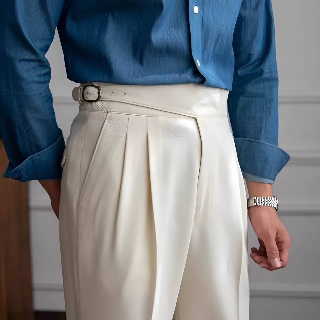 Man wearing black high-waist straight-leg casual polyester trousers for leisure.