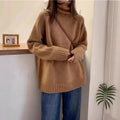 Women's loose turtleneck sweater with thick curling pile collar in solid colour