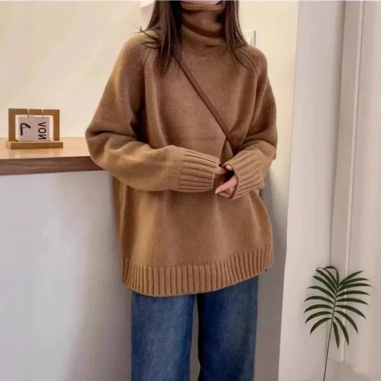 Women's loose turtleneck sweater with thick curling pile collar in solid colour
