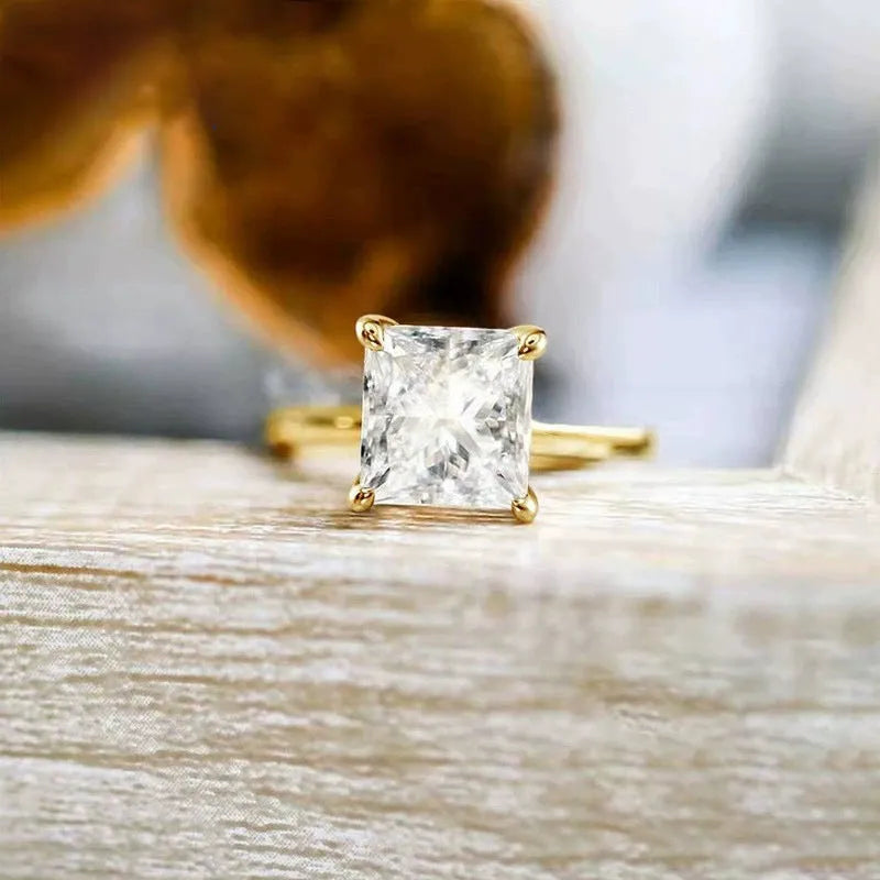 925 silver zirconium geometric ring for women in silver, gold, or rose gold colour on a plain background.