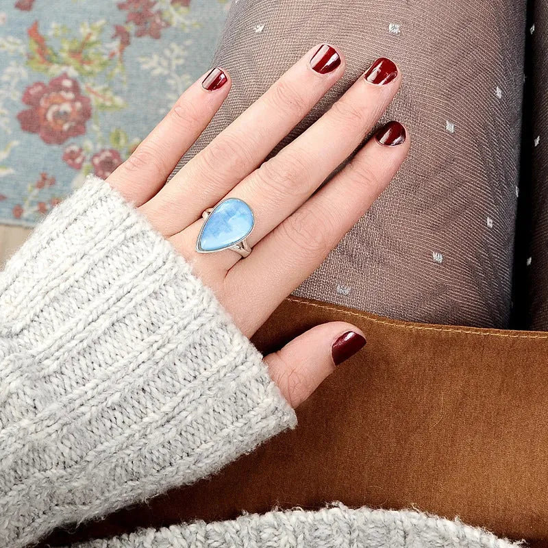 Copper ring with water drop geometric shape and white gold electroplated finish