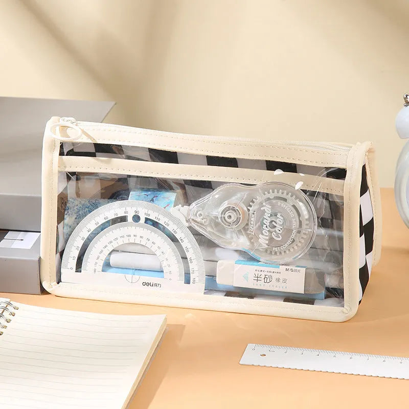 Transparent PVC pencil case with chessboard grid pattern showing pens inside