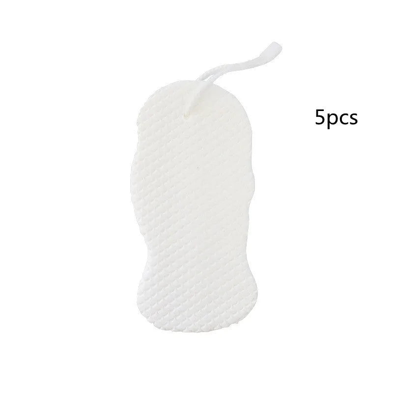 3D white bath sponge with fish scale pattern for gentle body exfoliation.
