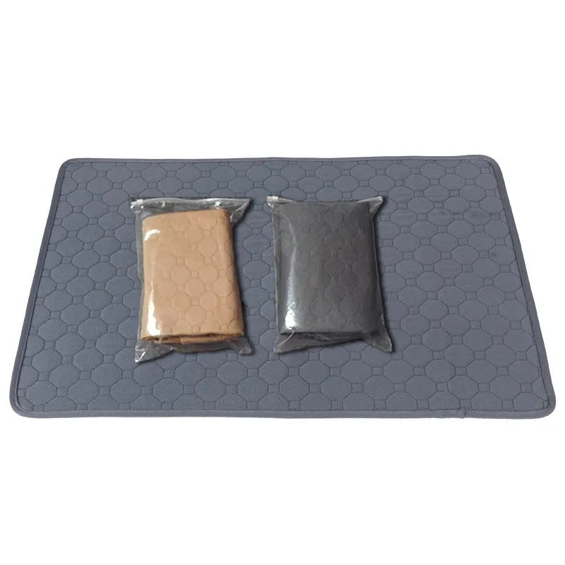 Washable dog pee pads in grey and tan colours showing multi-layer construction and triple-stitch binding