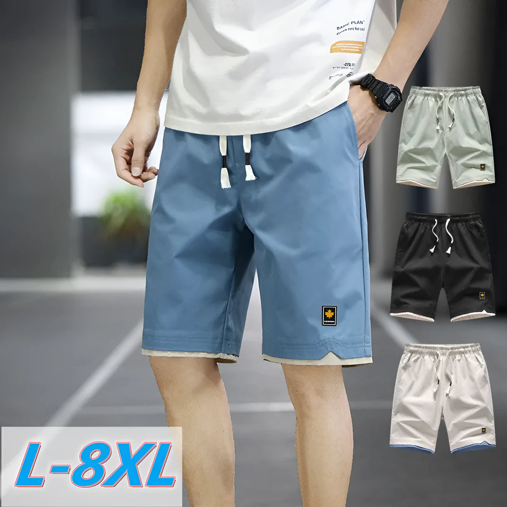 Korean style loose-fit straight-leg casual shorts in green, shown on a model.