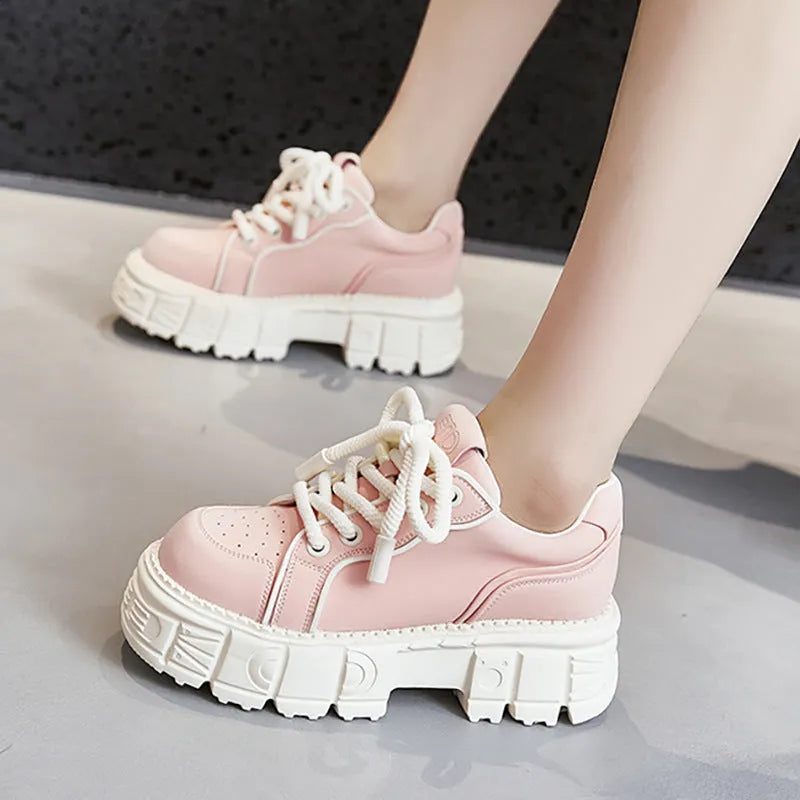Women's beige and pink muffin bottom leather casual shoes with a rubber foam sole.