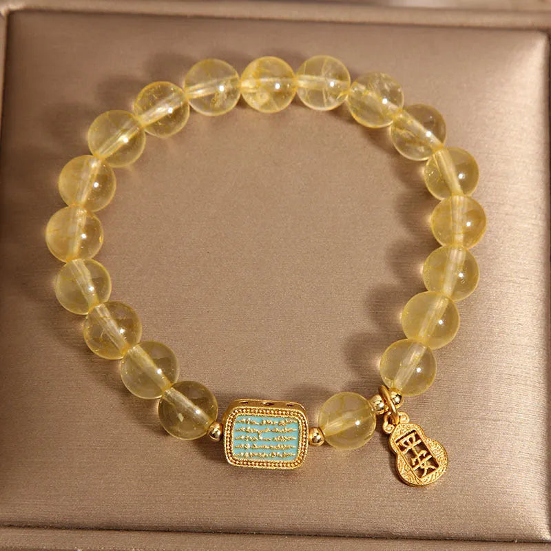 Women's natural yellow crystal bracelet with citrine colour and rhinestone detailing