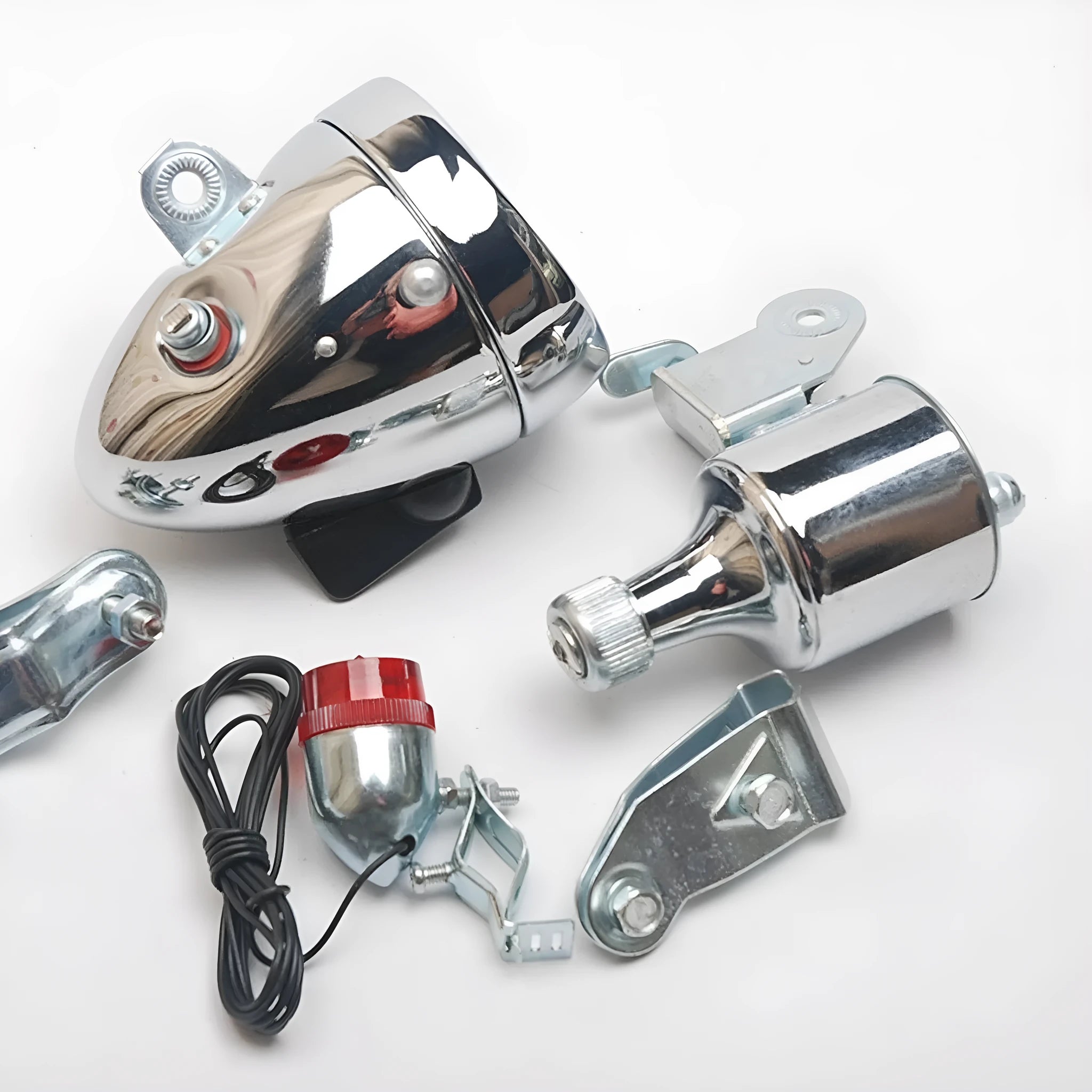 Silver bicycle dynamo-powered generator light set for front and rear bike lighting.