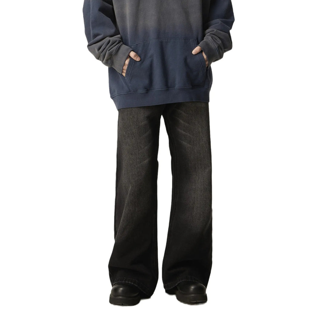Black retro straight leg jeans with loose fit and zipper fly on hanger