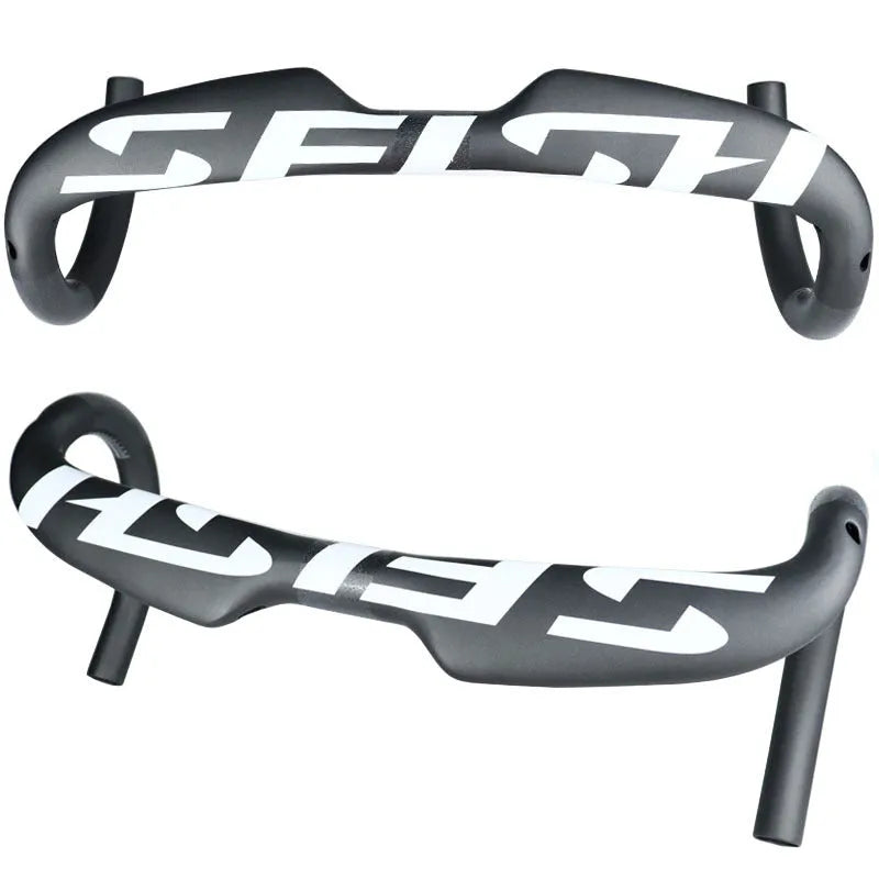 Carbon fibre road bike drop handlebar showing bend profile, available in multiple widths and light colour finishes.