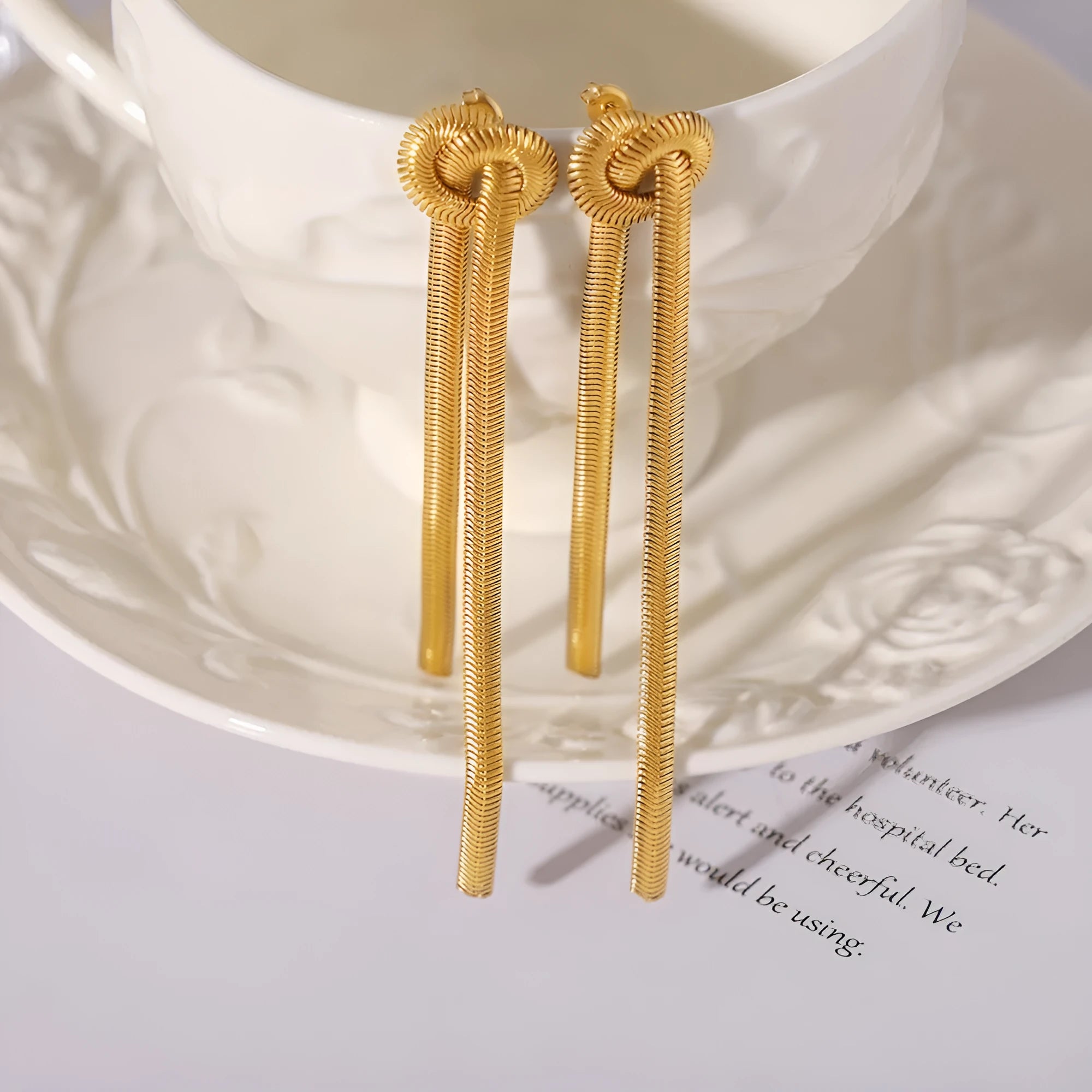 Gold knotted tassel snake chain necklace and matching earrings set
