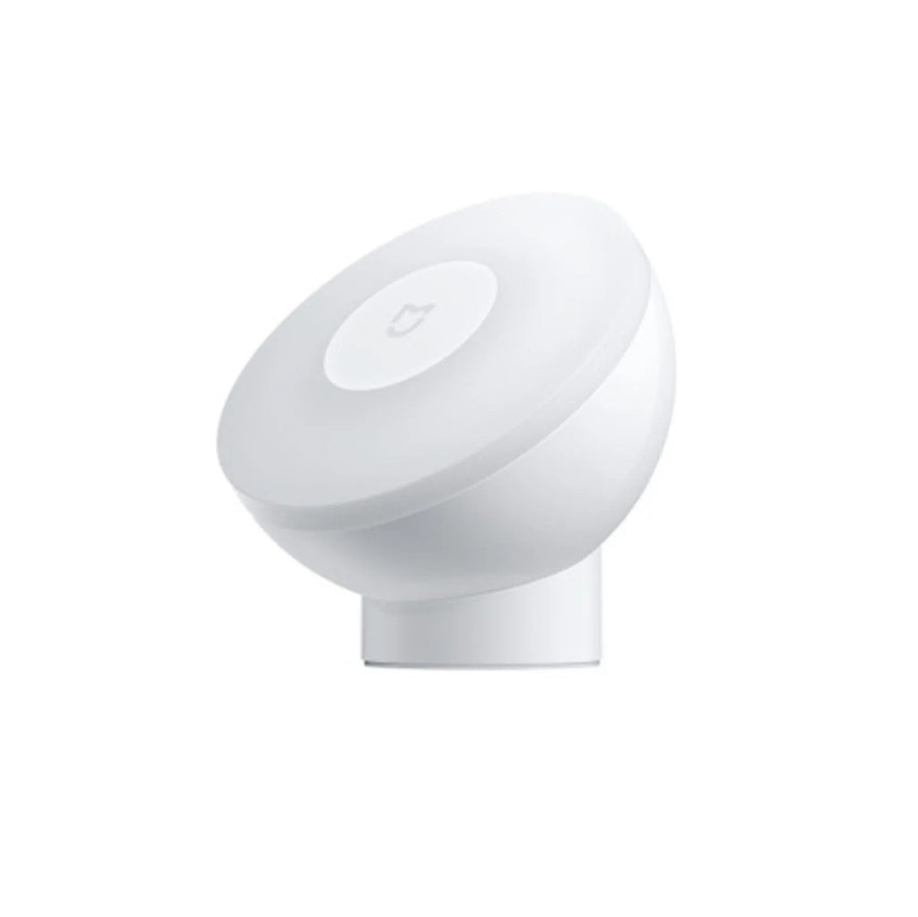 White modern Mijia Night Light 2 Bluetooth bedside lamp with human body induction on wooden table