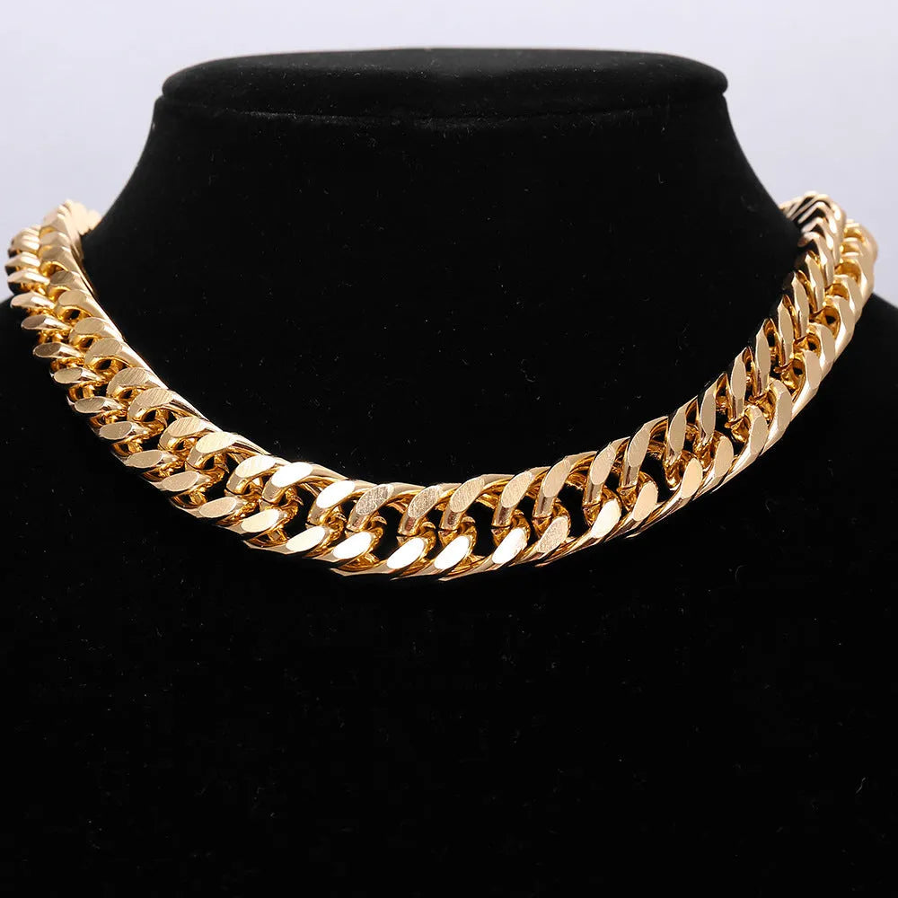 Women's gold thick chain necklace showing 32cm length with 6cm pendant detail