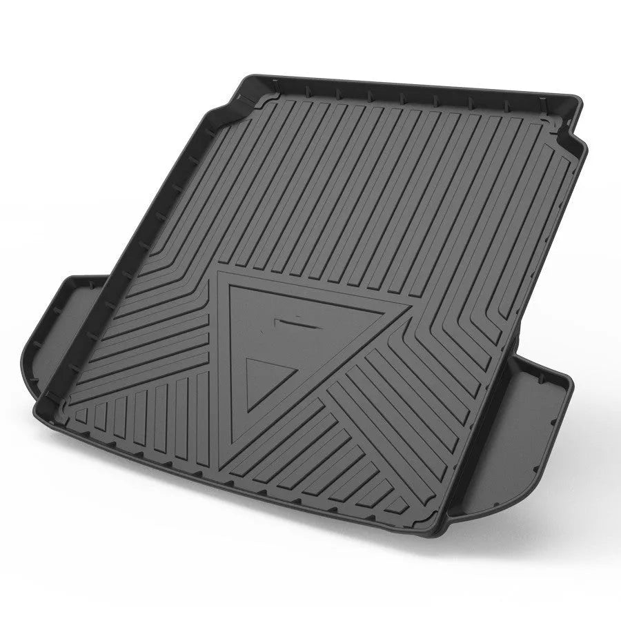 Black car boot liner with carbon fibre pattern, designed for a model-specific TPE tail pad fit.