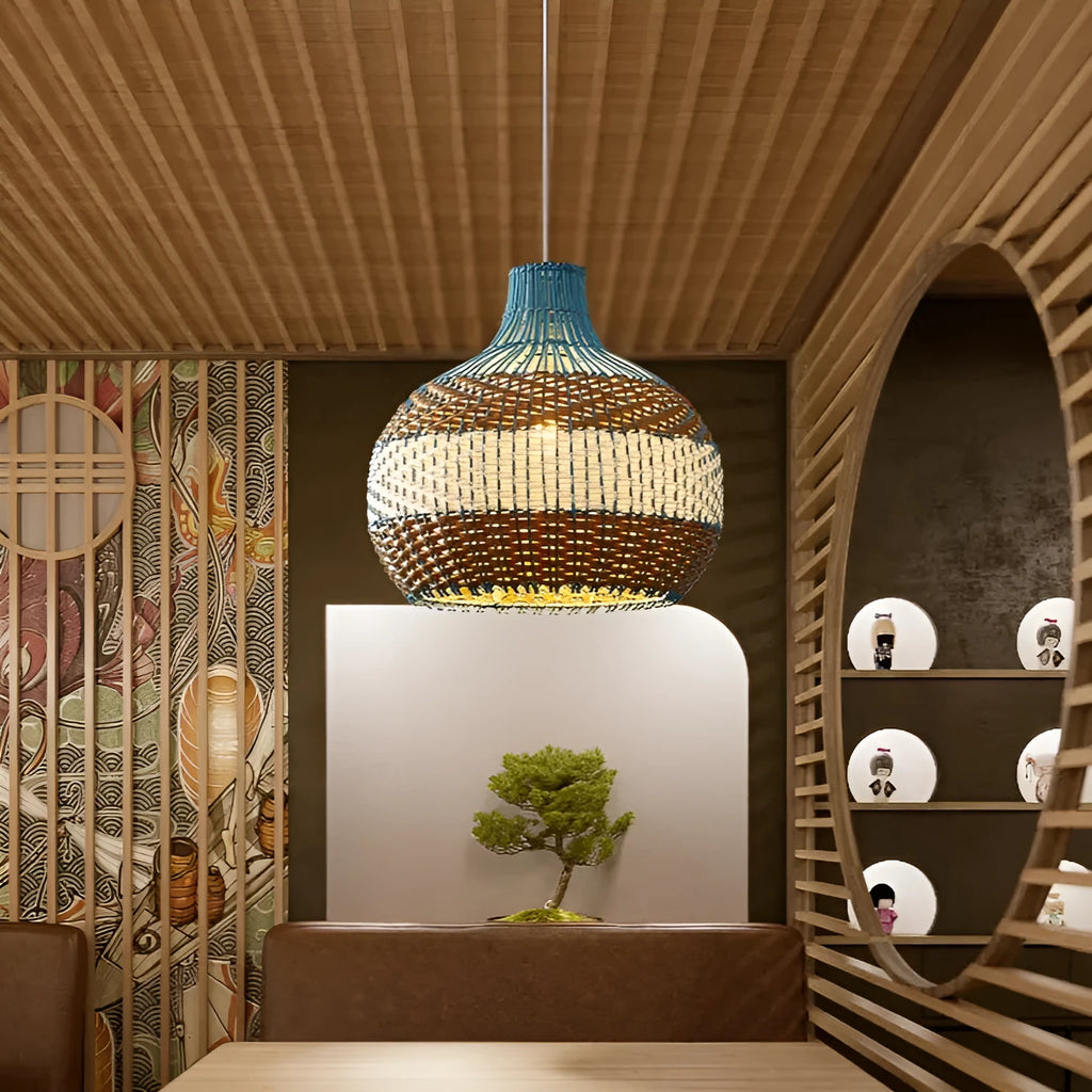 Vine woven pendant lamp in pastoral Southeast Asian style with warm lighting