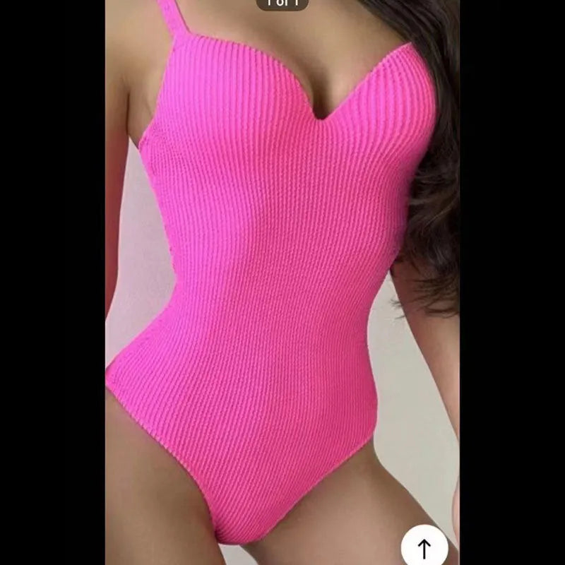 Women's black sleeveless one-piece swimsuit with a sunkissed stripe pattern on a mannequin.