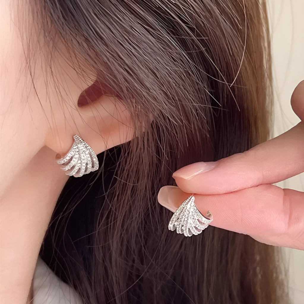 Women's geometric zircon earrings with platinum electroplated finish and clean line design
