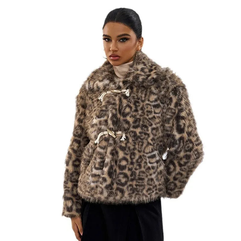 Women's leopard print polyester coat with a buckle detail on the lapel.