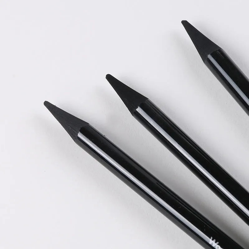 Carbonized Pencil Suit showing six graphite pencils and three carbonized pencils on wooden casing with suction card packaging