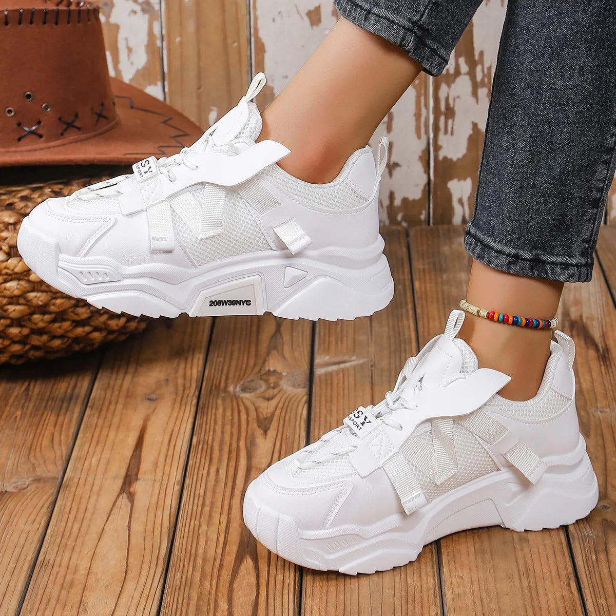 Women's purple platform mesh sneakers with lace-up front on wooden floor