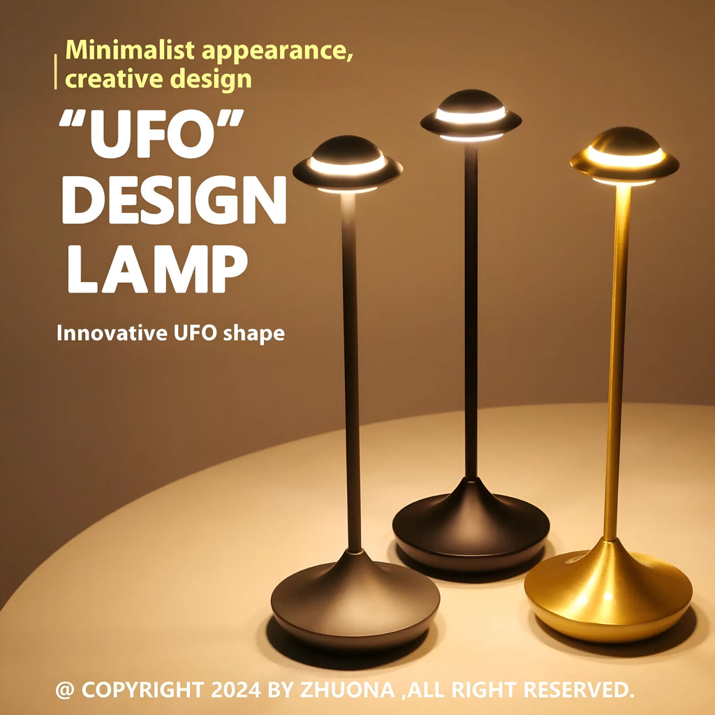 UFO-shaped metal table lamp with touch dimming control in gold, grey or black finish