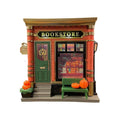 Cartoon-style resin and plastic Christmas house small night lamp ornament on white background.