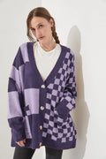 Grey loose fit knitted cardigan with a printed checks pattern, showing regular sleeves and a slim silhouette.