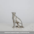 Leopard resin home ornament in American Leopard colour on wooden surface