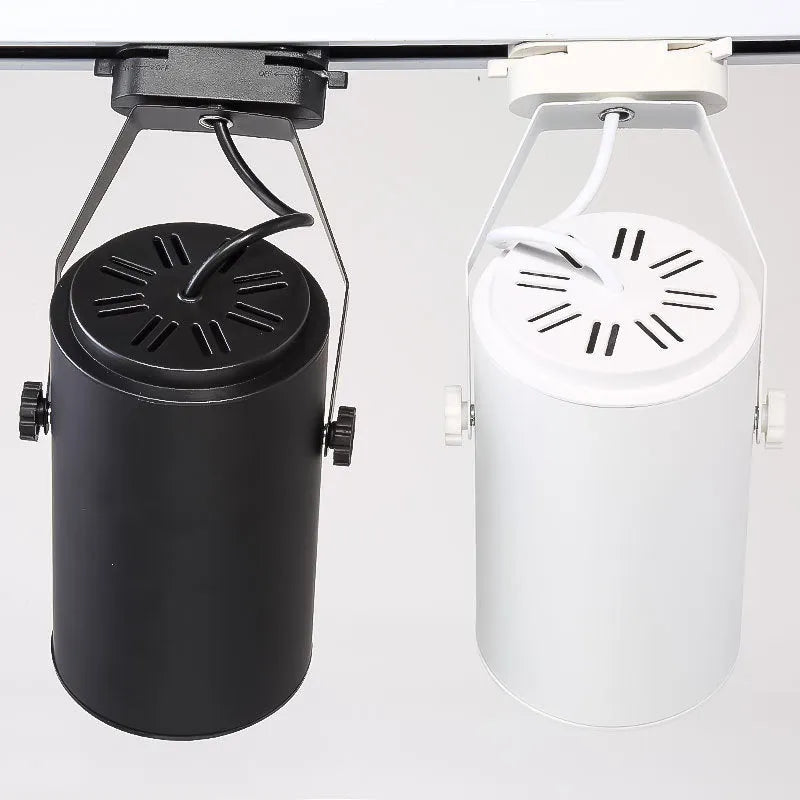 LED track spotlight with a slide mount in a choice of black or white aluminium shell.