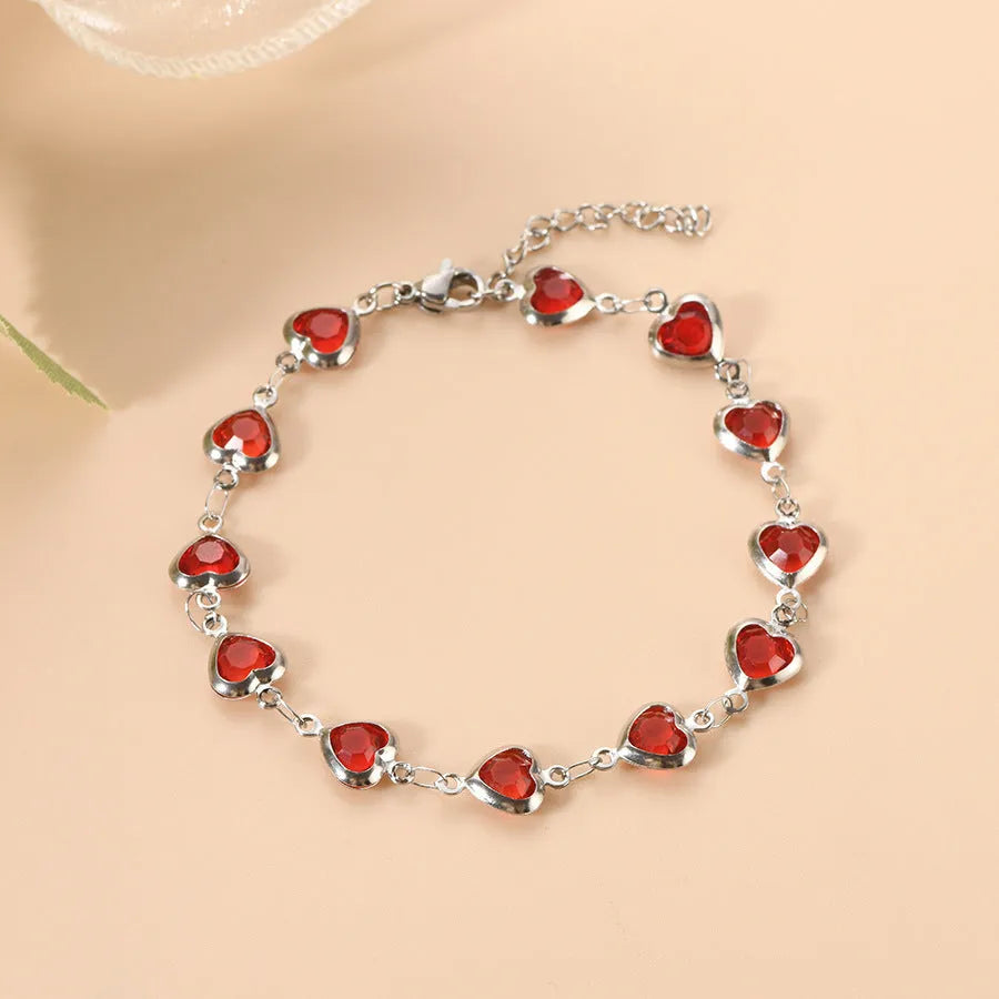 Devil's Eye creative heart stainless steel bracelet in colourful, royal blue, dark green, red, light green, and light blue options