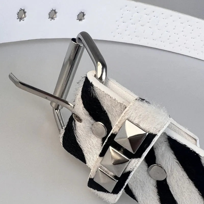 Women's punk fashion belt with metal decorative rivets in pyramid stud patterns including brown leopard, white zebra, and rose red leopard options
