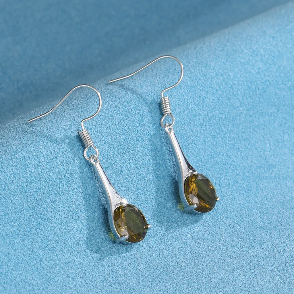 Olive green drop shape fashion earrings with a retro minimalist style.